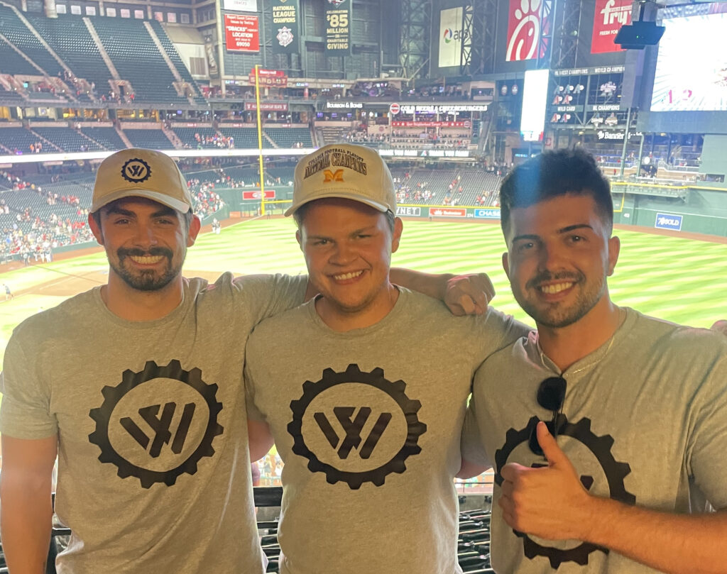 Wealth Factory team members at the Arizona Diamondbacks game, celebrating the first pitch sponsorship